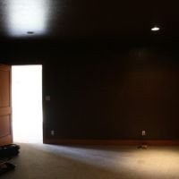 This is a view, looking at the back of the room in that same project. The customer told us, "Just do what you can to make us a great theater!"