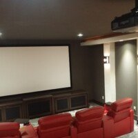 This quality theater system was designed during the building stage of the new home. It features equipment from KEF, Marantz, Screen Innovations, and Epson. Great fun!