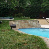 The audio system around this swimming pool is fantastic! The underground subwoofer fills the back yard with nice rich base, and the speakers are all pointed at the house, so they don't disturb the neighbors...