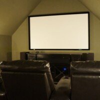 As you can tell by the shape of the walls, this was an attic. It is now a high quality home theater system, featuring equipment from Epson, Vutec, Marantz, KEF, and Sunfire. Came out great!