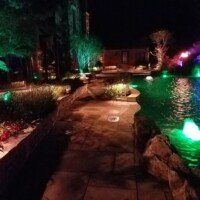 Do you think the lighting adds to the beauty of this swimming pool?!