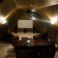 This is a front view of the previous picture, showing the quality theater system now in this attic. Looks like fun, doesn't it? These folks wanted a place for their grandchildren to be entertained, and now they spend most of their time there!