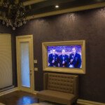 This TV looks nice in the master bedroom, framed in, doesn't it?
