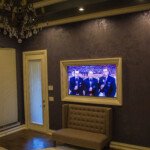 This TV looks nice in the master bedroom, framed in, doesn't it?